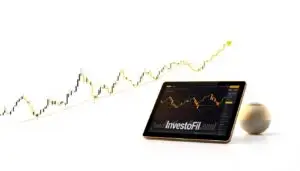 Detailed technical analysis strategies for gold trading, depicted in an elegant, minimalist style. In the foreground, a sleek graph charting price movements, rendered in shades of gold and black against a clean white backdrop. The middle ground features a tablet displaying multiple technical indicators, their lines and curves intersecting to reveal patterns. In the background, a subtle Investofil logo, hinting at the professional financial services powering this analytical expertise. Muted lighting casts a soft, authoritative glow, emphasizing the precision and sophistication of these trading techniques.